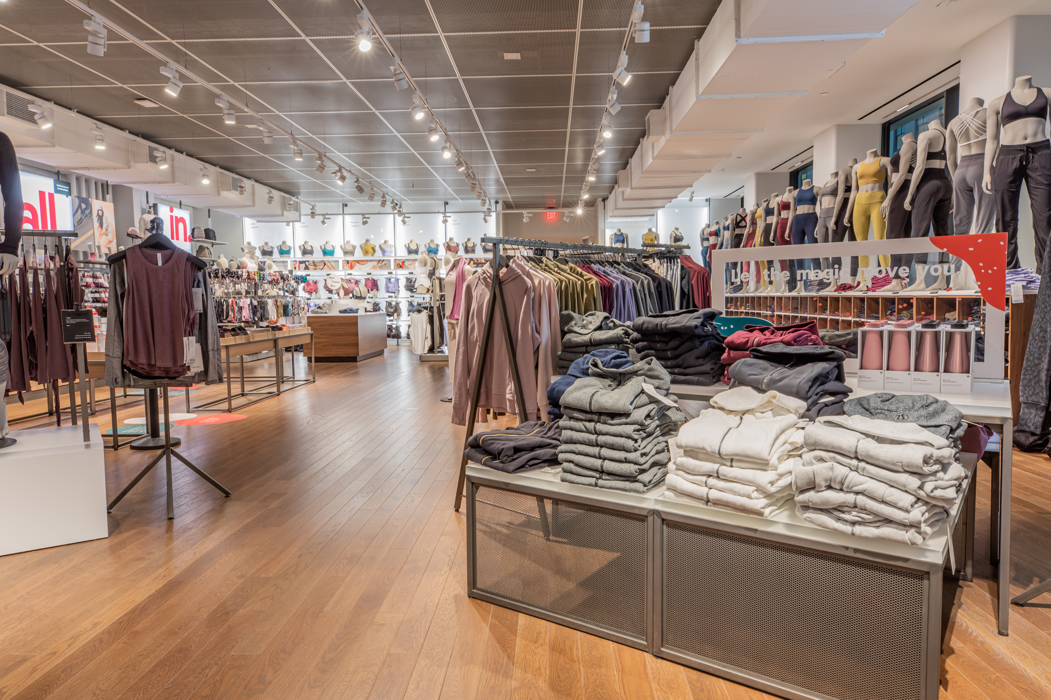 Premium commercial wood floors by PID Floors throughout lululemon 5th Avenue NYC multi-level space