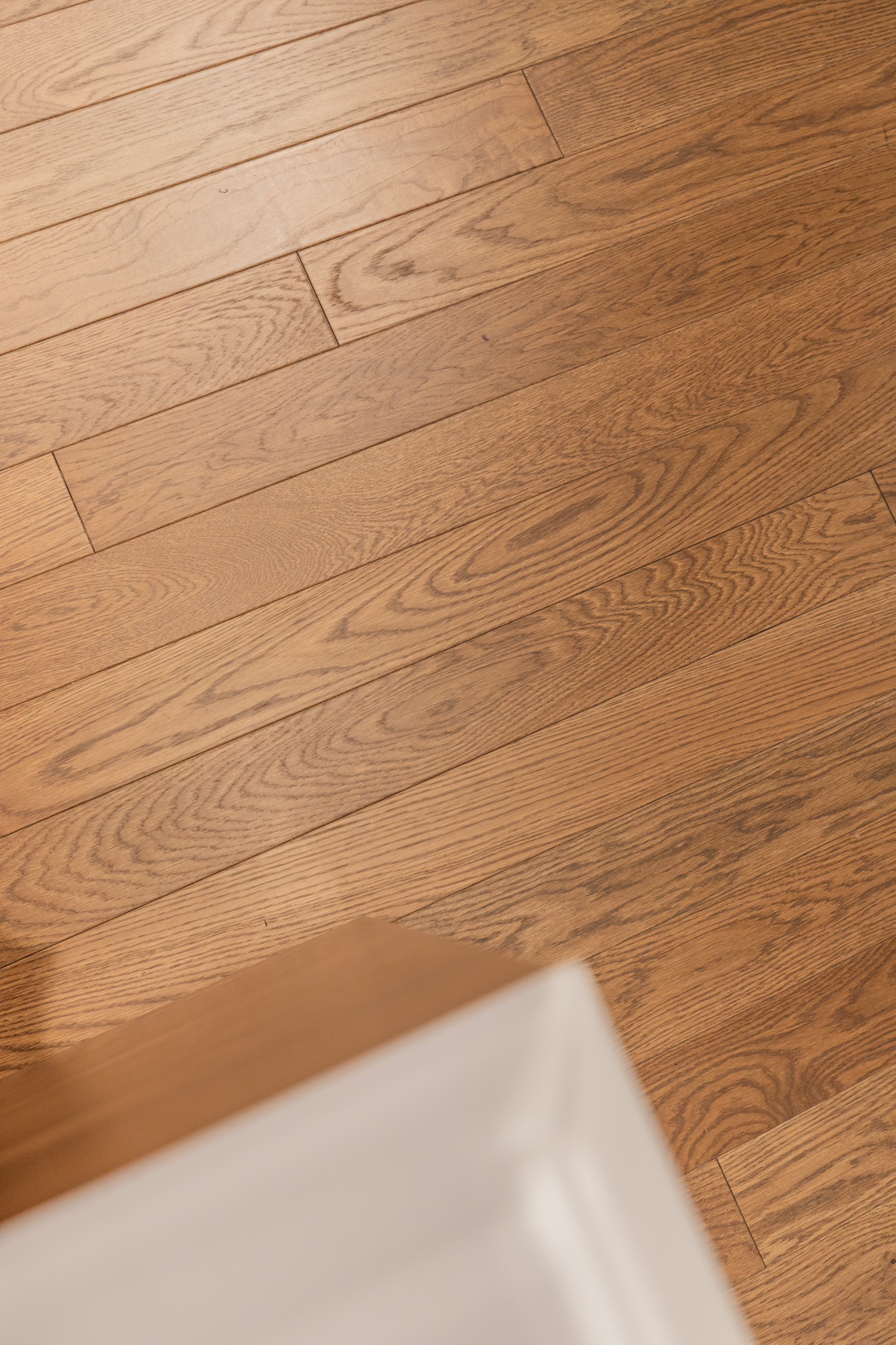 PID Floors high-traffic luxury hardwood floors in lululemon 5th Avenue commercial environment