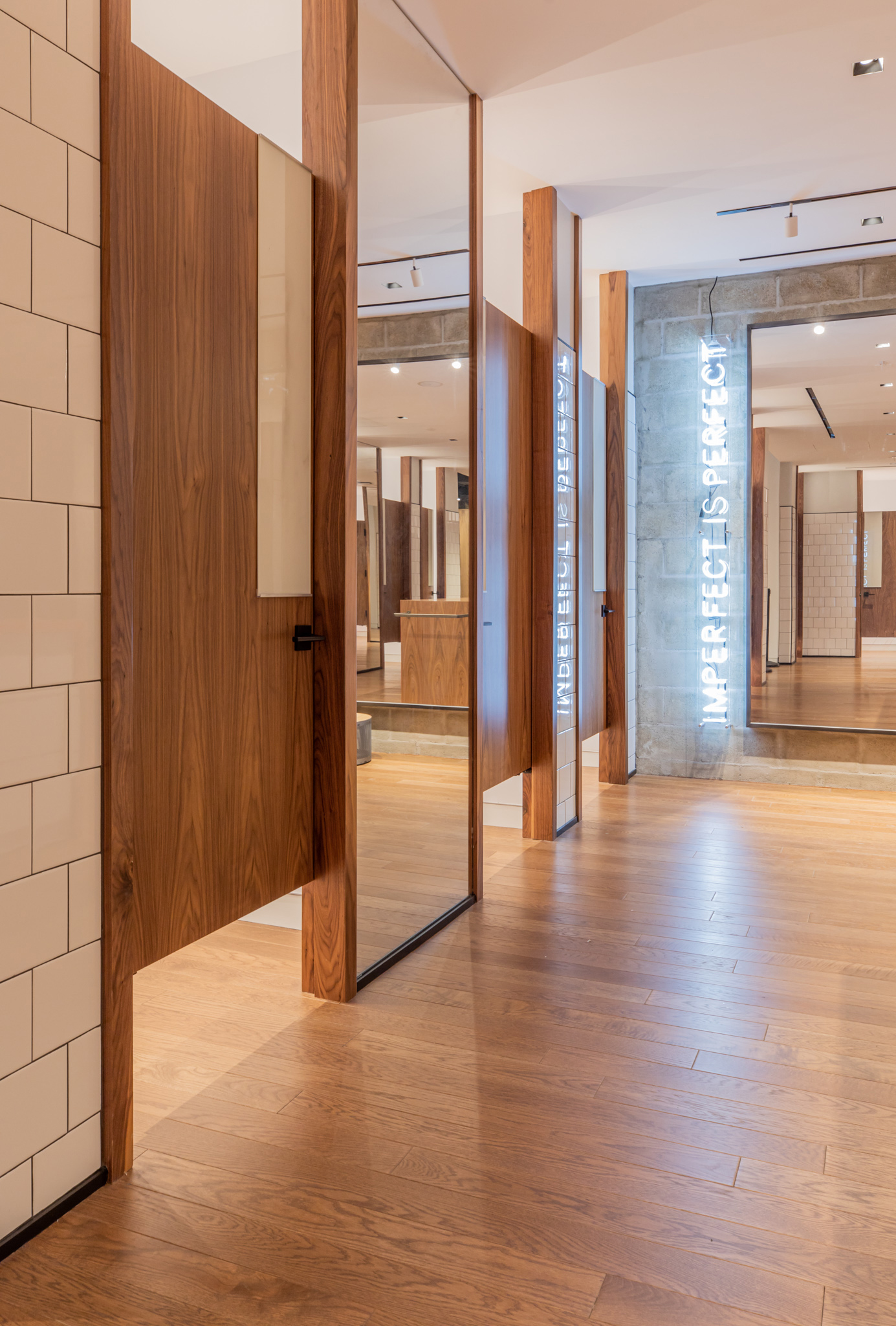 Custom hardwood flooring craftsmanship by PID Floors at lululemon 5th Avenue athletic retail space