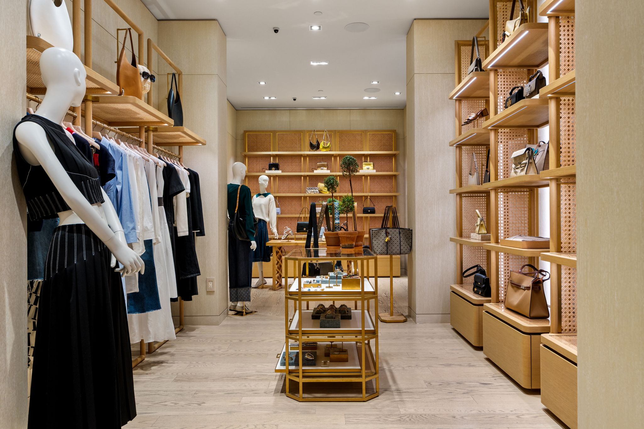 PID Floors hardwood installation inside Tory Burch boutique at Aventura Mall