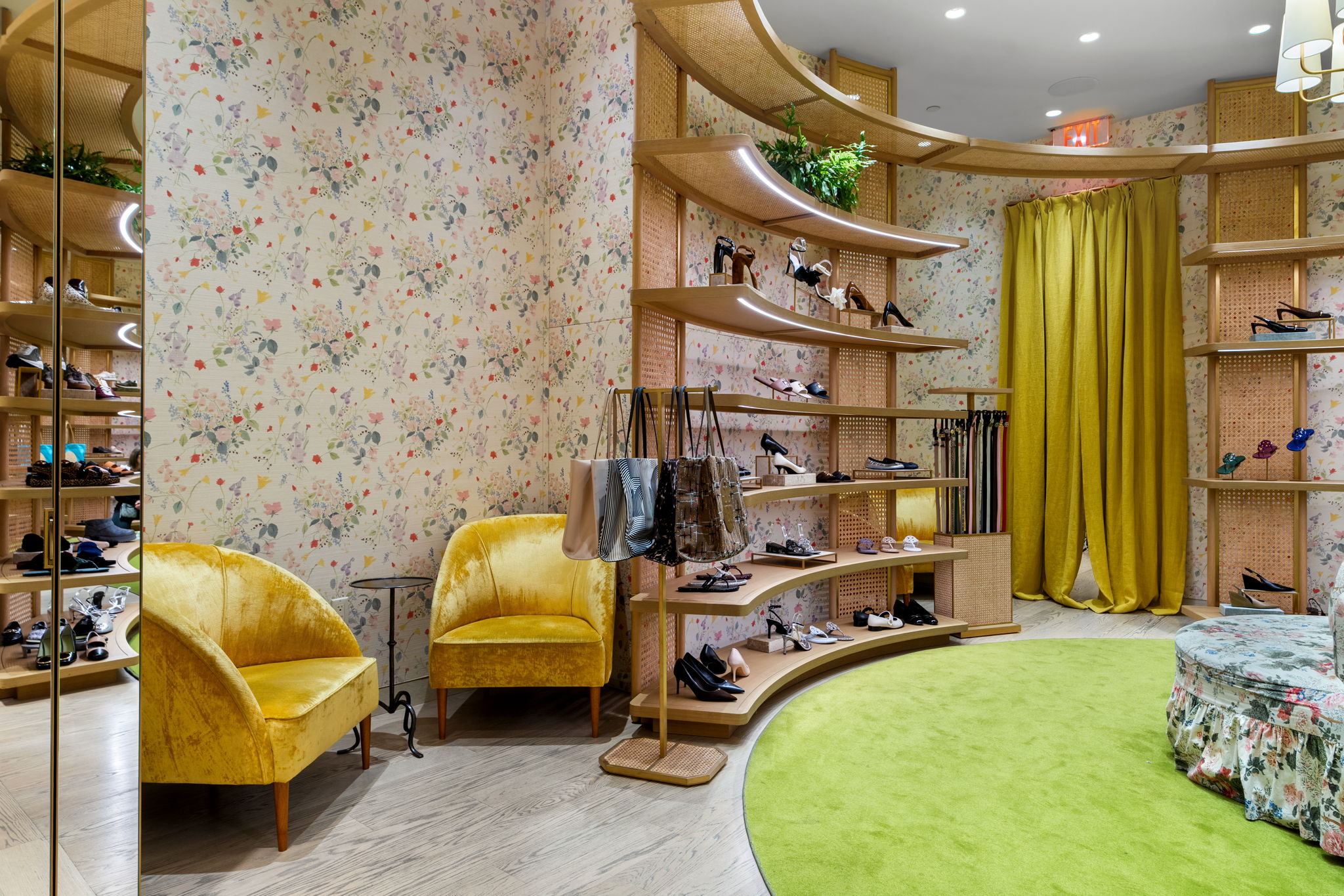 Tory Burch merchandise and accessories showcased over PID hardwood flooring