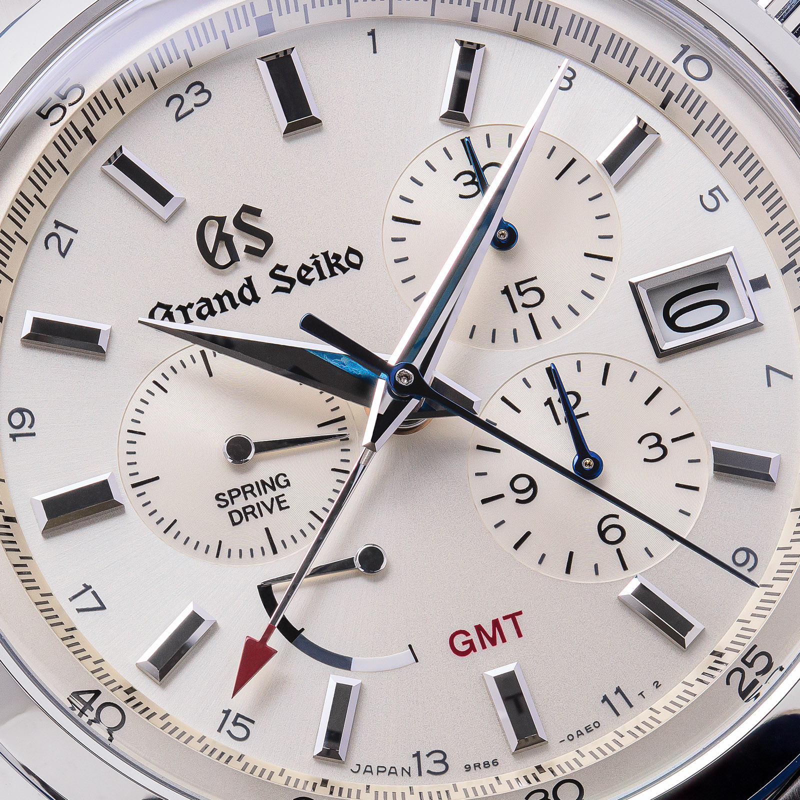 Grand Seiko wristwatch SBGC201 - macro of a white dial with a multi-register chronograph layout. 