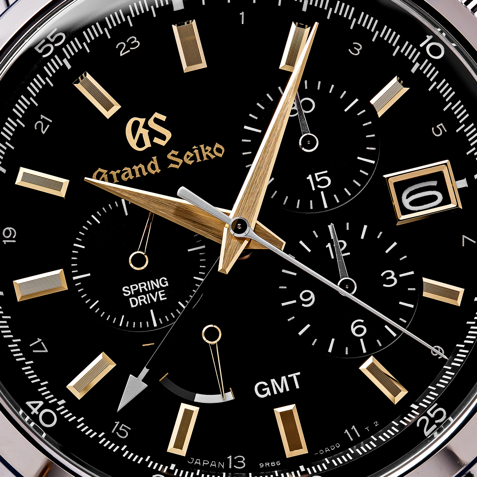 Grand Seiko SBGC205 Chronograph - macro of black dial with gold-tone accents. 