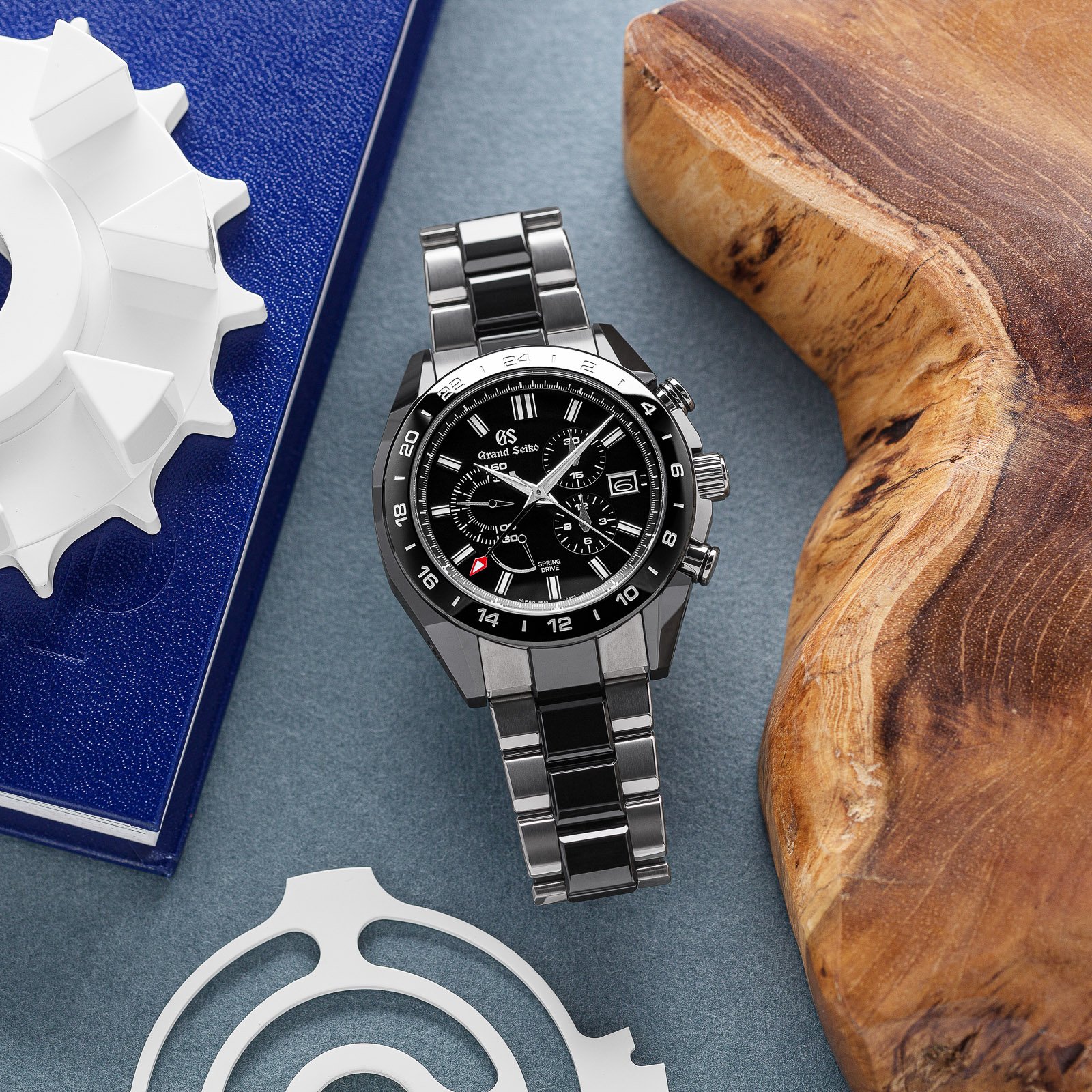 Grand Seiko SBGC223 Chronograph - black dial wristwatch with a titanium and ceramic case. 