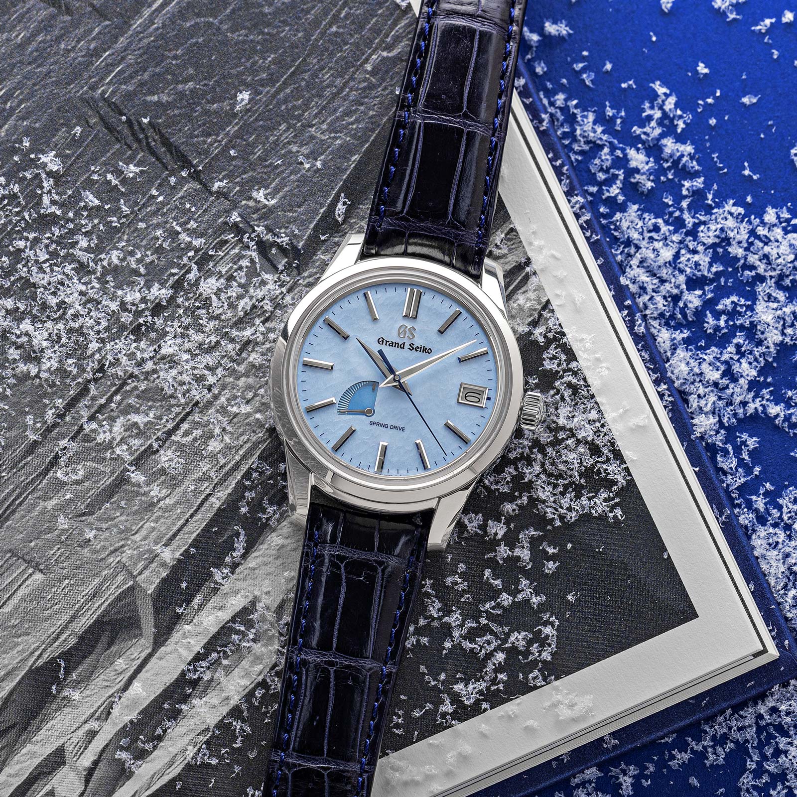 Grand Seiko SBGA407 watch with blue Snowflake dial and crocodile strap.