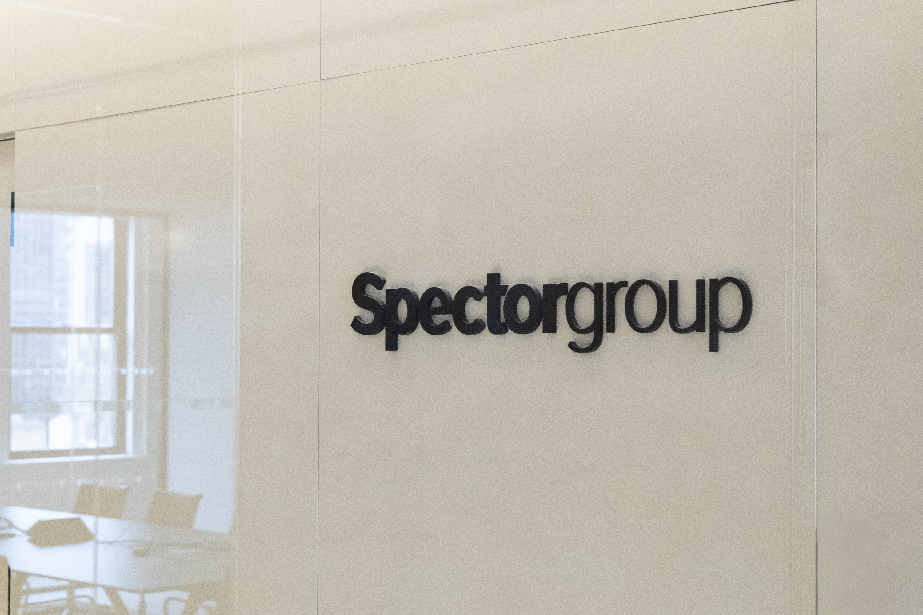 Architectural and interior design professionals reviewing premium flooring samples at Spectorgroup
