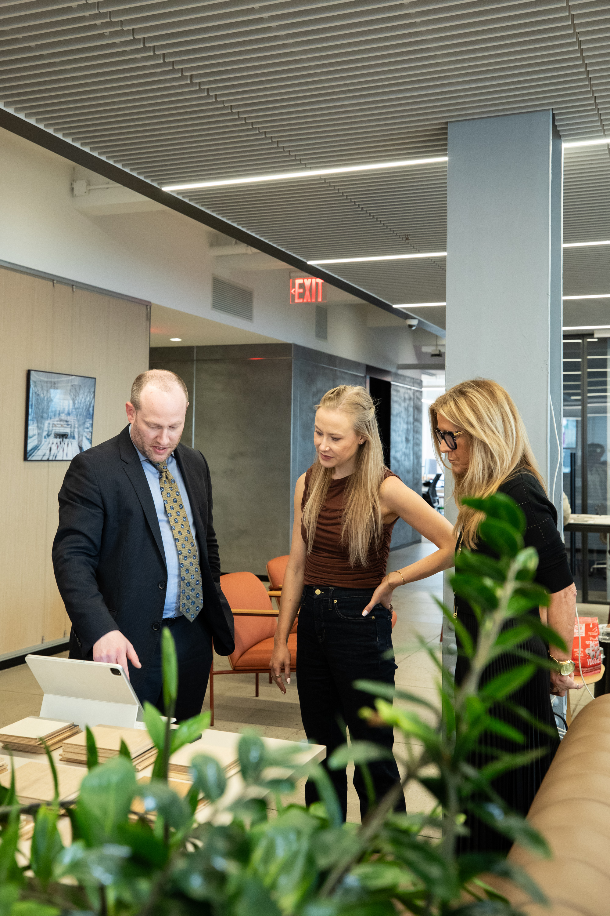 PID Floors team discussing custom hardwood flooring solutions with architects

