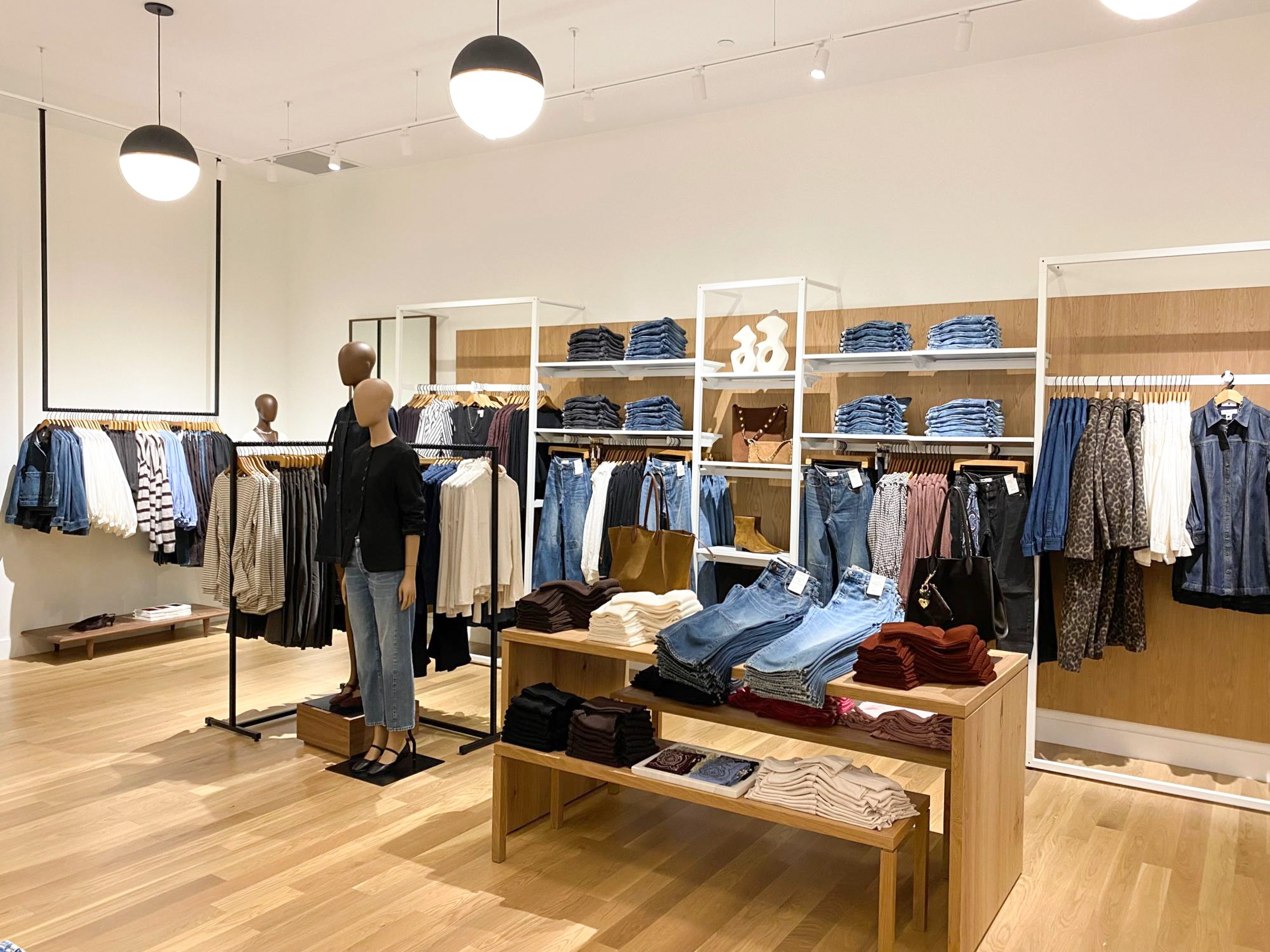 Detailed view of commercial-grade hardwood floor craftsmanship in Madewell store