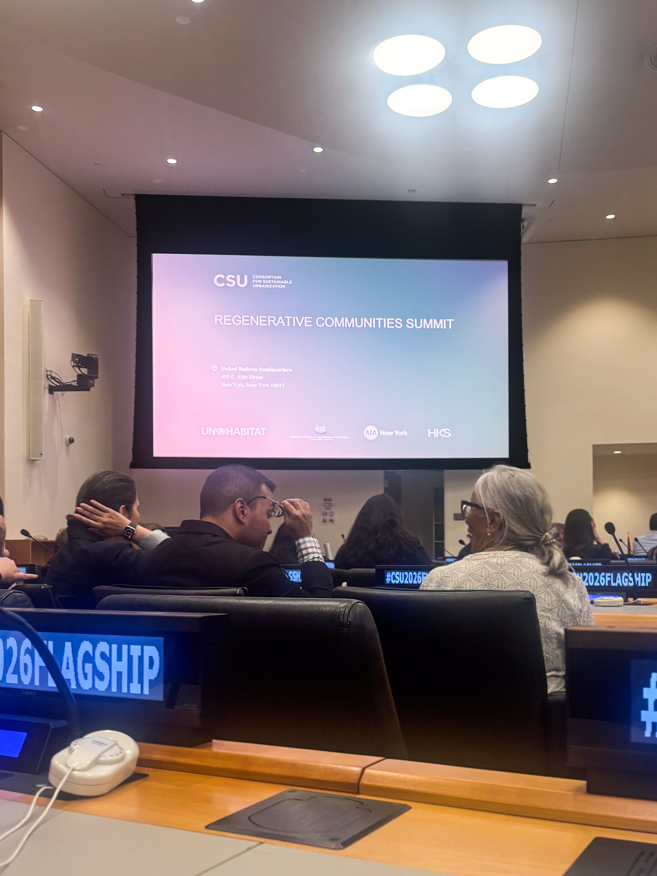 United Nations conference room hosting discussions on sustainable development and regenerative communities
