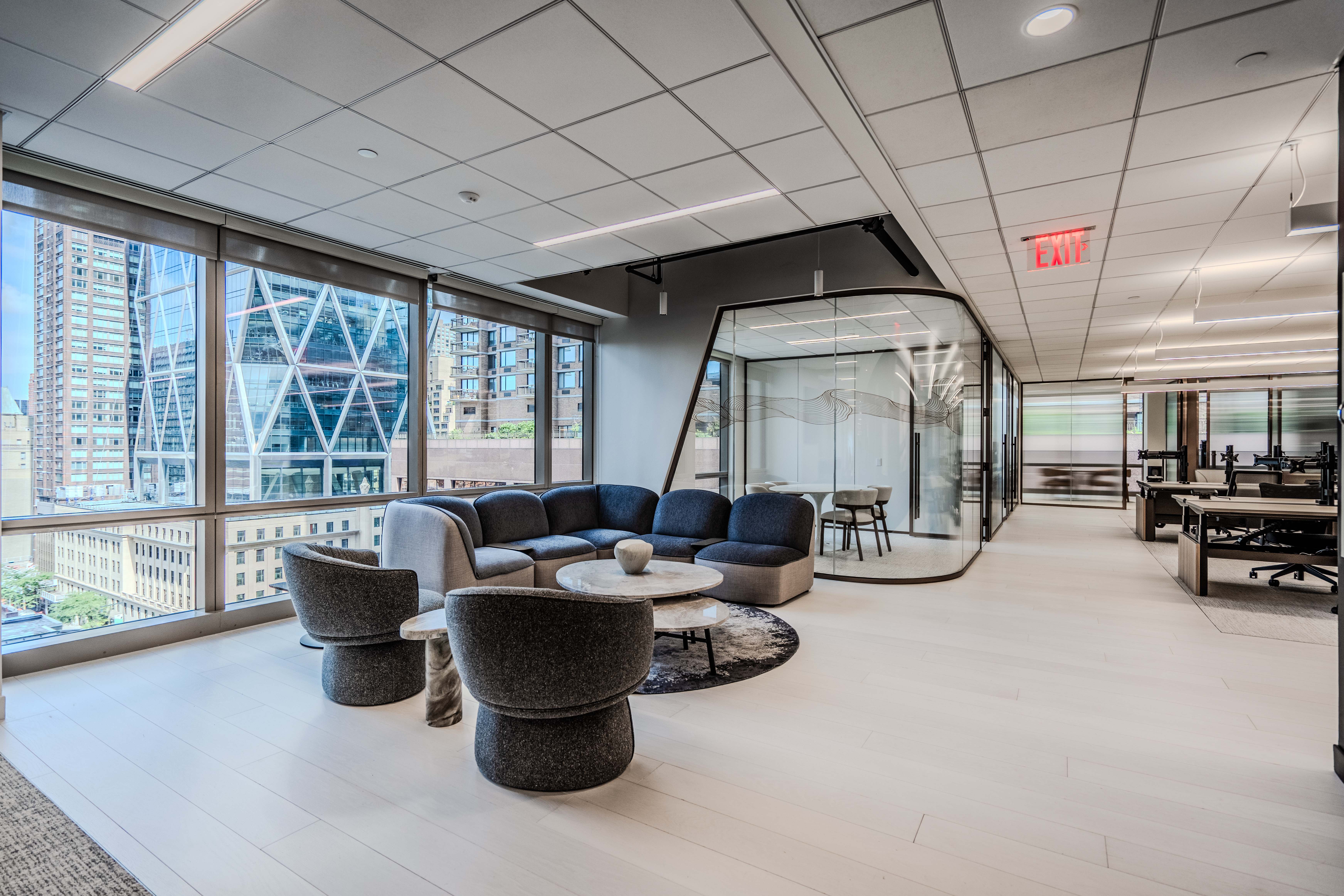 Reflor commercial office interior featuring wide plank engineered hardwood flooring by PID Floors in New York