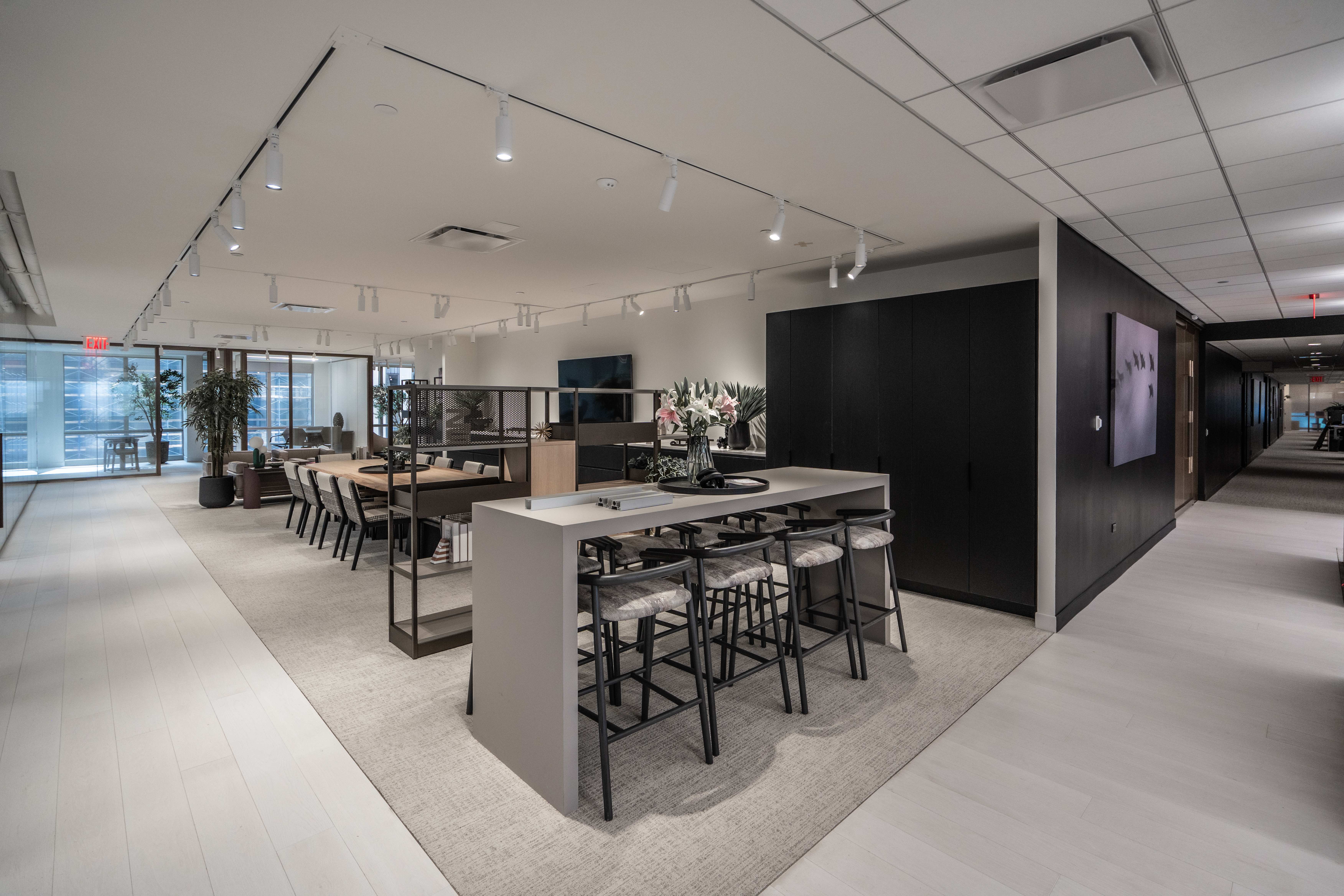 Modern business interior with wide plank hardwood floors and collaborative workspace design by PID Floors