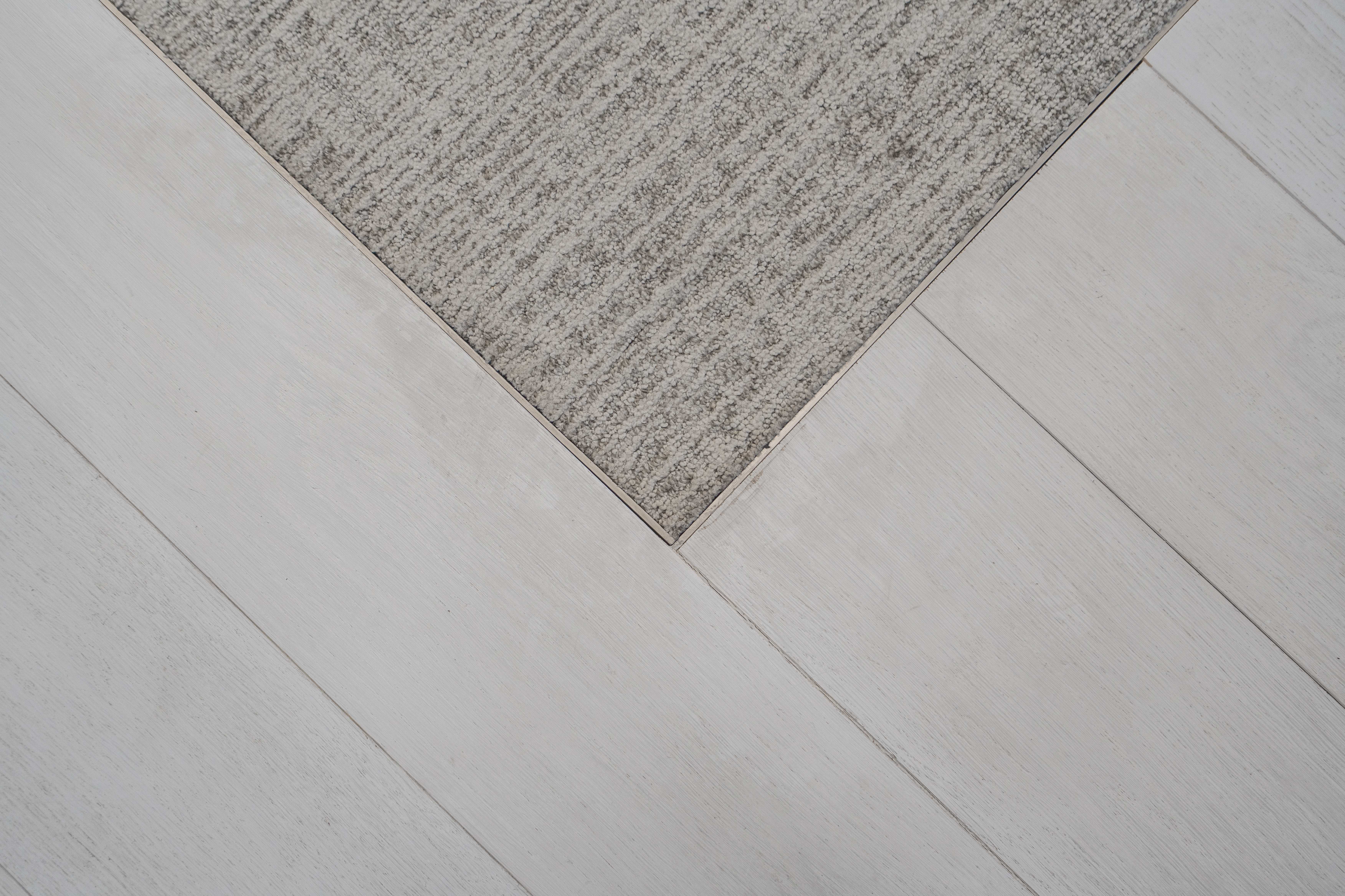 Professional workplace interior featuring custom wood flooring and architectural detailing by PID Floors