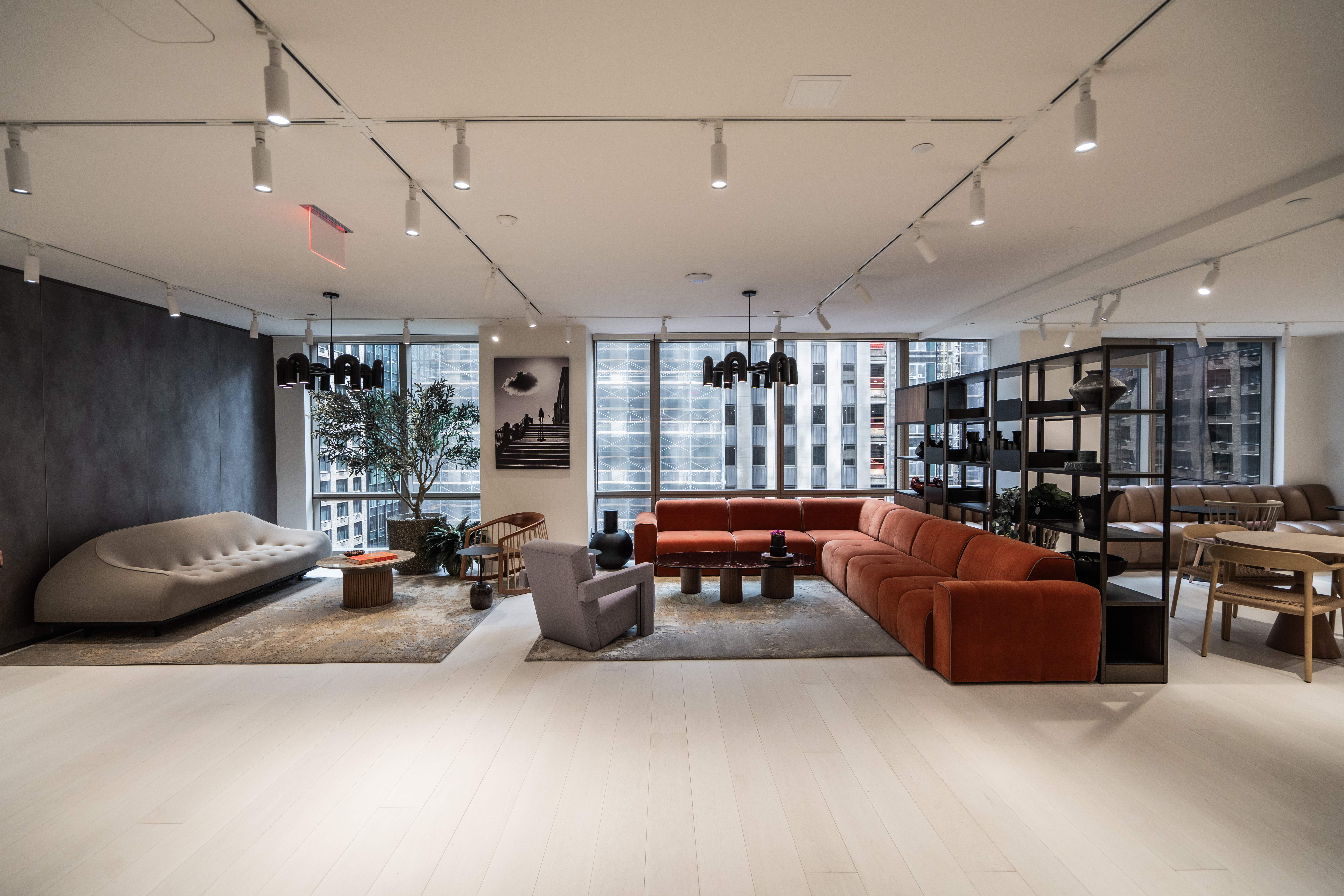 Reflor commercial flooring project showcasing wide plank hardwood floors and contemporary office aesthetics by PID Floors