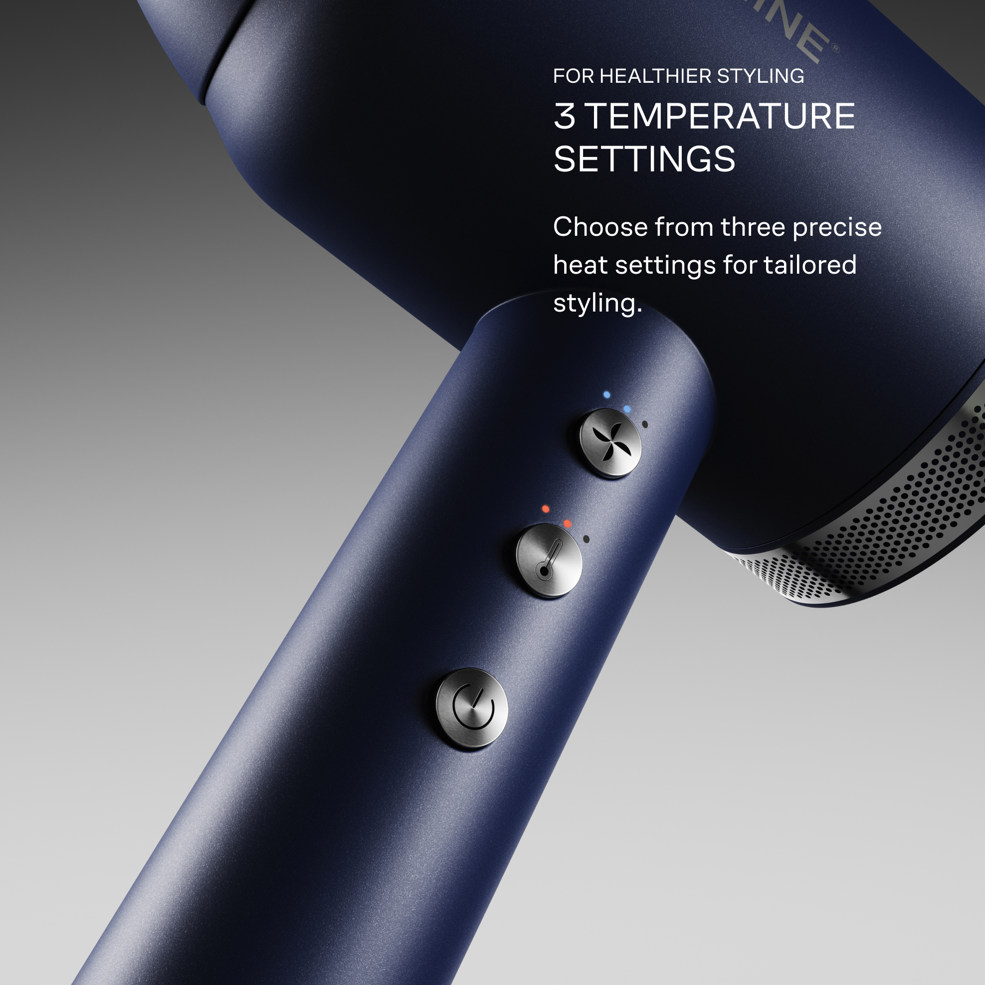 Close up of Cloud Nine Airshot Pro hair dryer in Midnight Blue - showing three temperature settings control panel and cool shot button