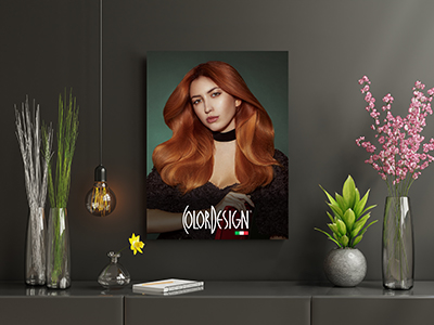 A poster of a woman with long red hair looking at the camera, there are flowers in vases on a table