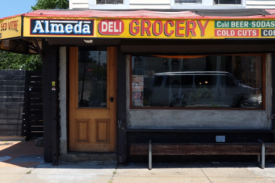 The Almeda Club's storefront is a converted bodega. 