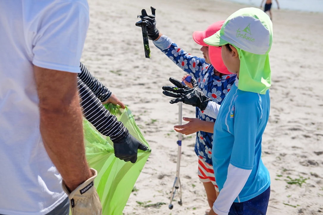 Even the youngest among us put on their gloves and got to collecting! 