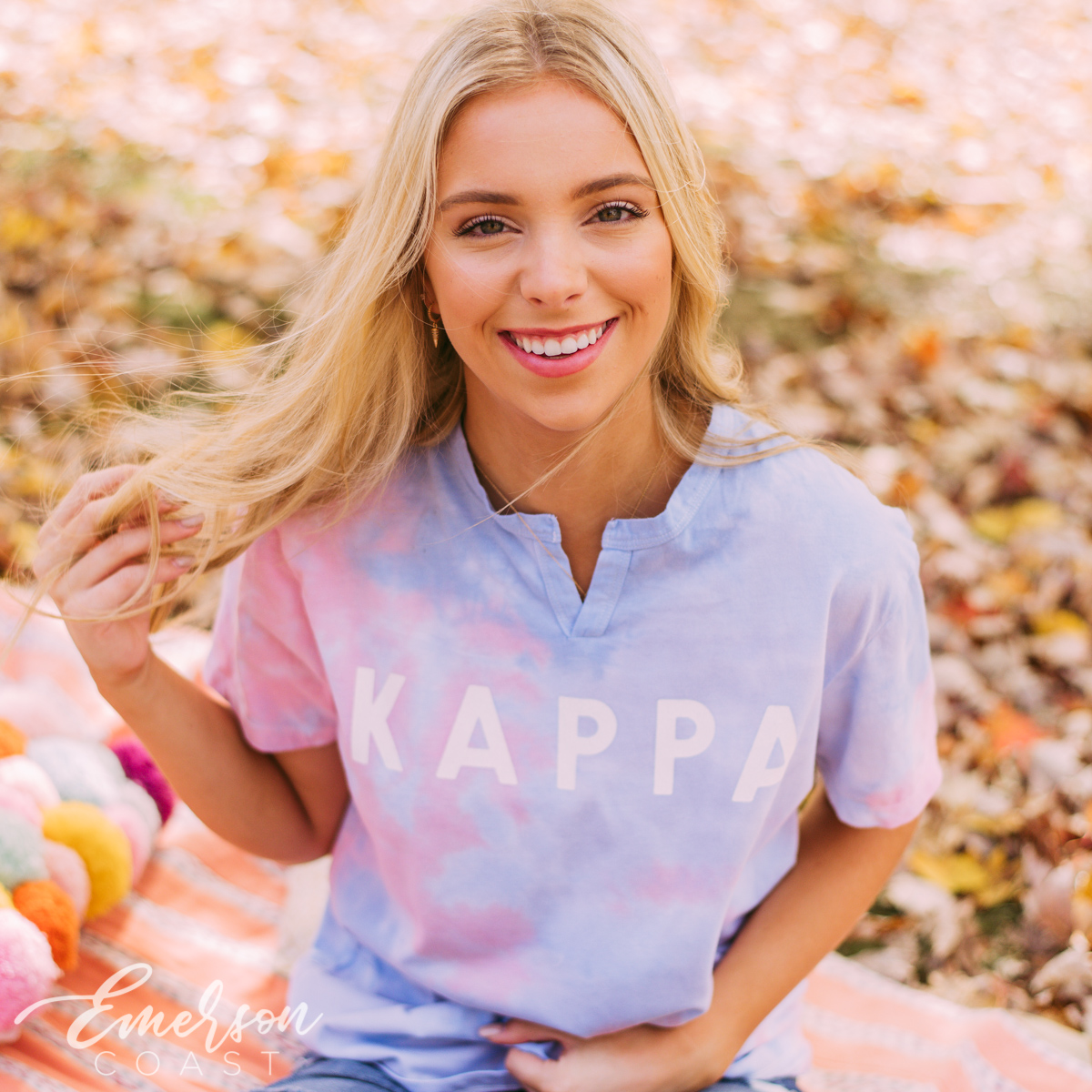 girl wearing a pi phi ash gray sweatshirt
