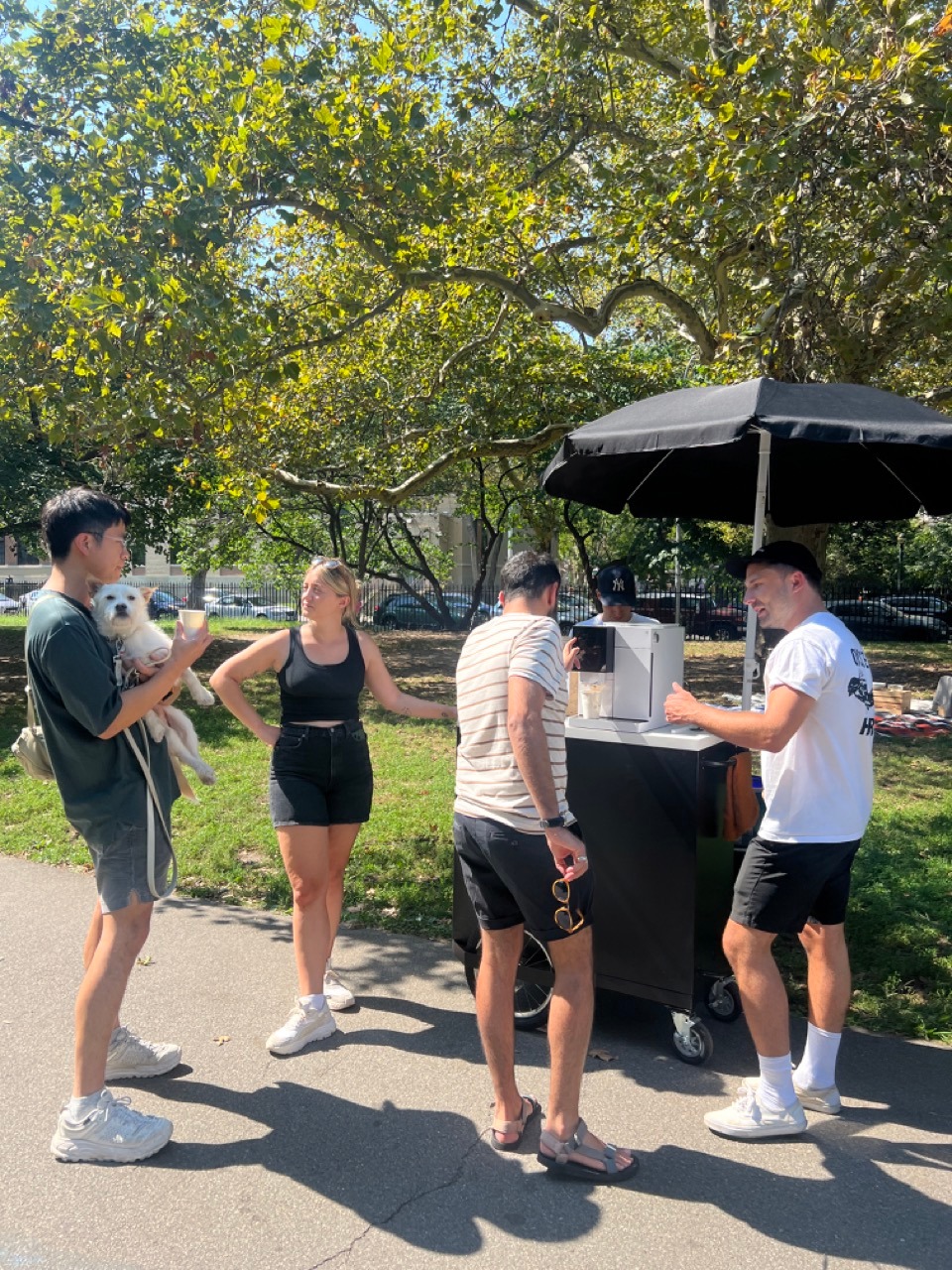 BK residents gather around the TK-02 to see how it works.