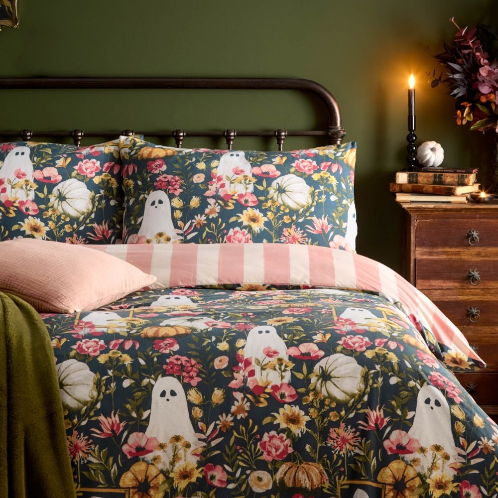 Gothic romance ghost reversible bedding featuring florals and playful ghosts with a reversible pink and cream stripe.