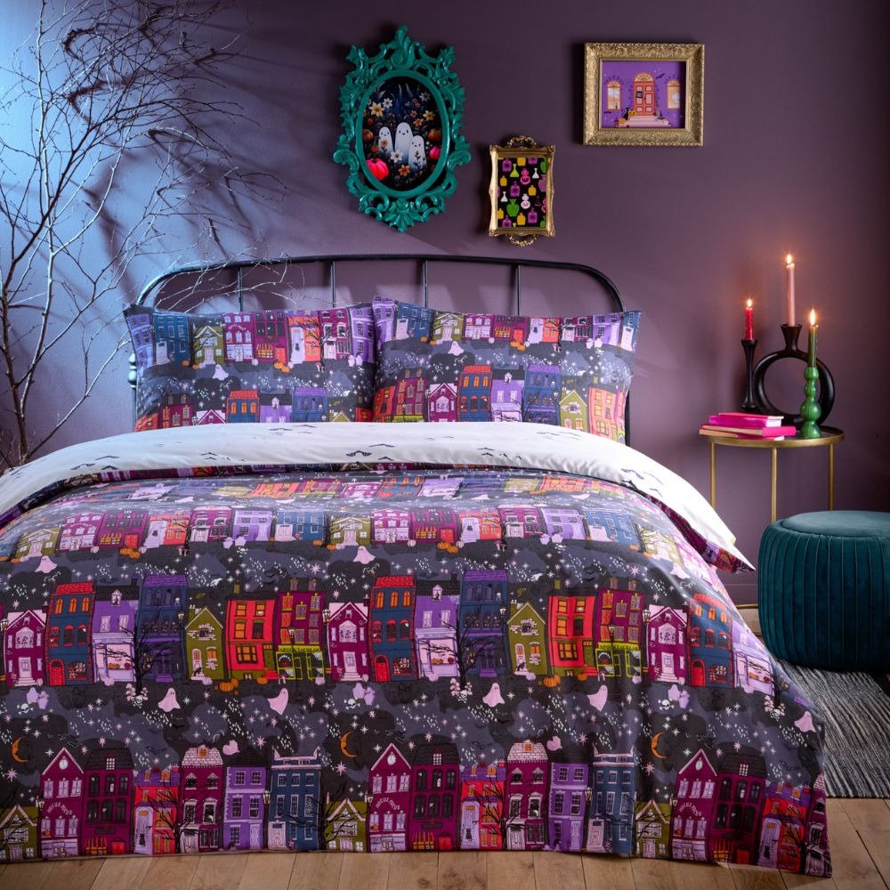 Reversible halloween bedding, purple creepy town featuring halloween style houses