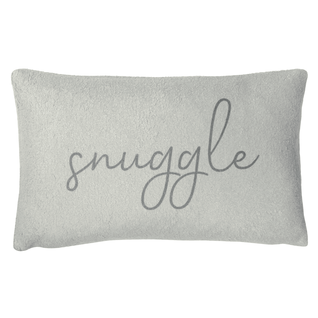 a grey shearling rectangular cushion with the word 'snuggle' on the front