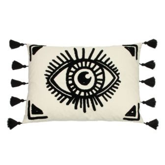 A boho-style cushion with an alternative printed design of an evil eye in a monochrome colourway, complete with tassel edging in black.