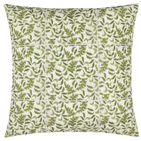 an outdoor cushion with a flourish-like leafy green pattern rendered as tiles.