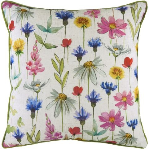 a cushion with a floral print on it featuring wildflowers you might find in a meadow.