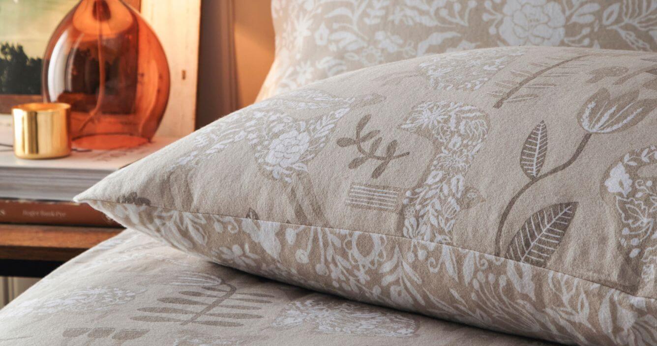 A brushed cotton bedding set with a Scandi style woodland design.