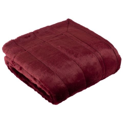 A faux fur throw in a ruby red shade, folded and presented neatly.