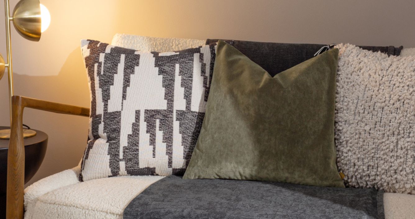 minimalist cushions in velvet green and boucle 