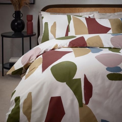 abstract print duvet set on bed