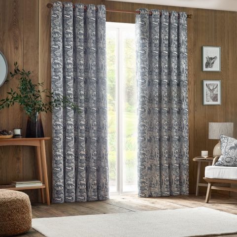 woodland printed curtains in a country style living room