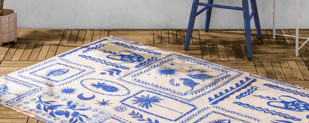 A rug featuring a digitally printed design of symbols and icons inspired by travels around the Greek islands.