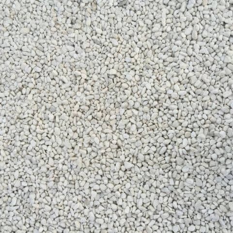 An aerial view of an outdoor gravel surface.