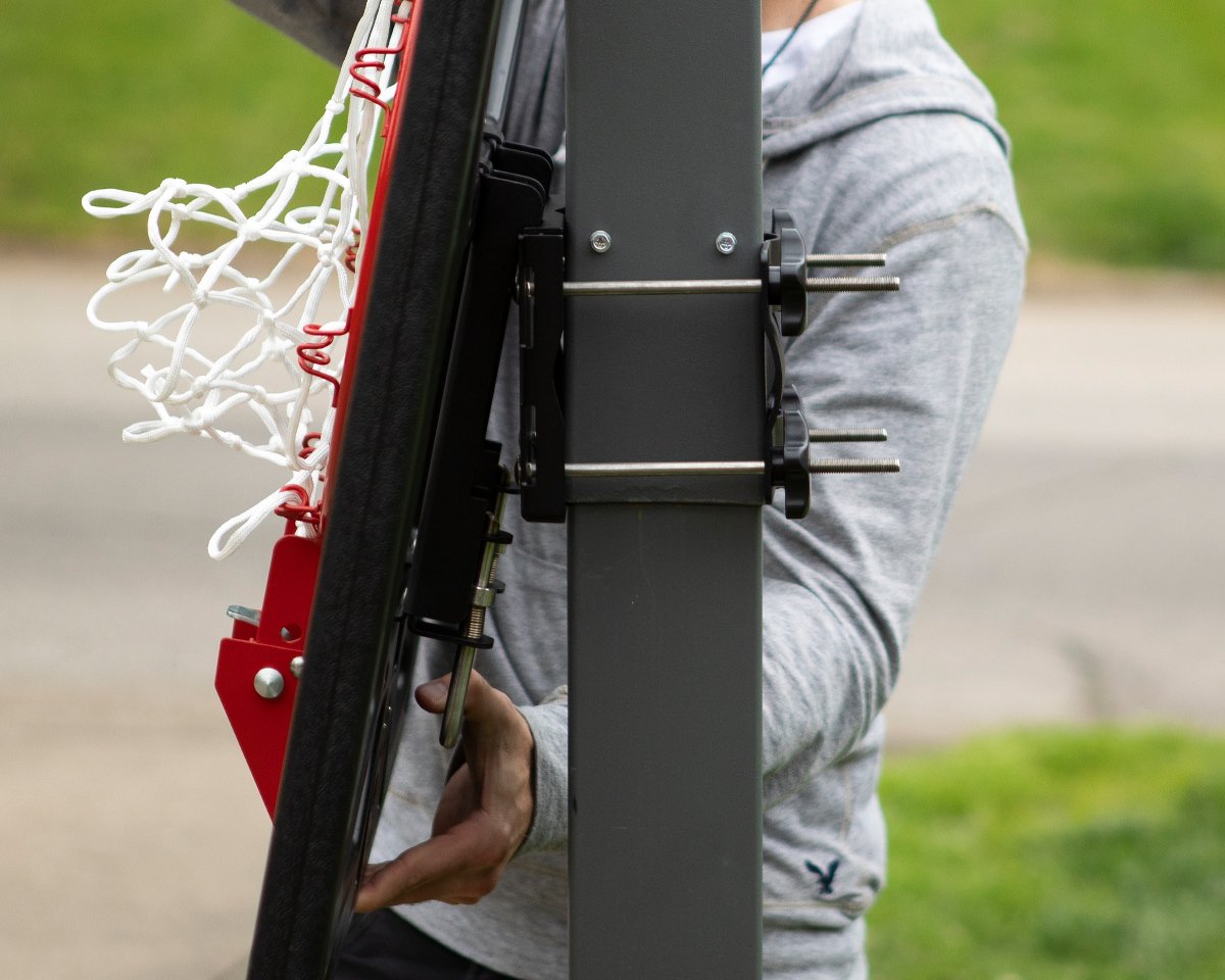Lock 'n Rock Technology mounting a Silverback Youth Junior Basketball Hoop to an In-Ground Basketball Goal