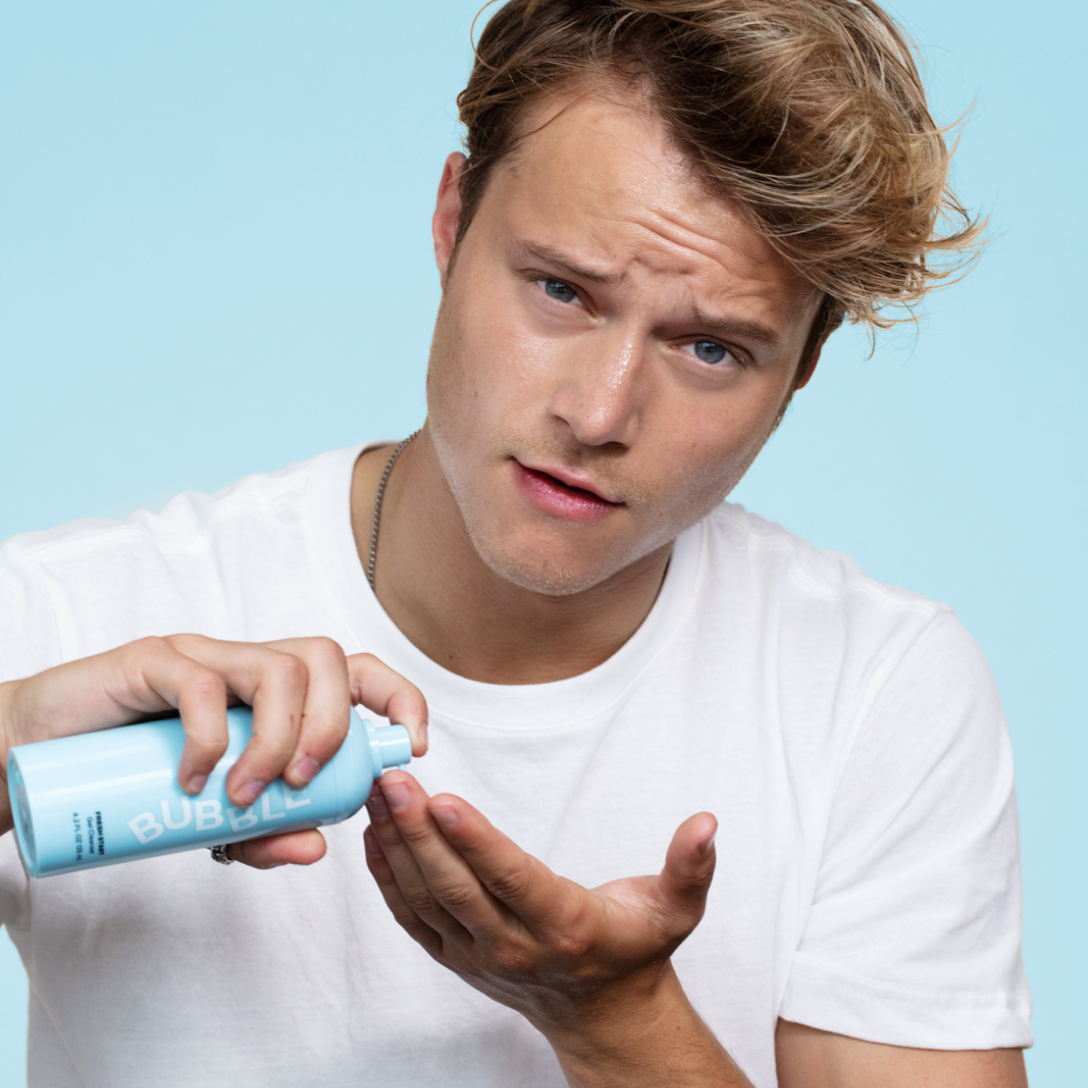 Male applying product part of a bundle. Skincare products, two moisturizers, two toners, one makeup remover, one cleanser, one clay mask.