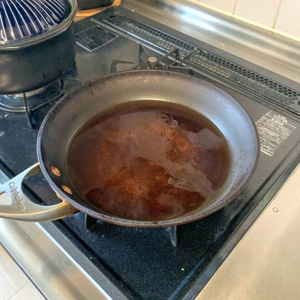 Simmering the sauce for katsudon