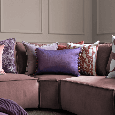 Layered Cushion Arrangement on Sofa