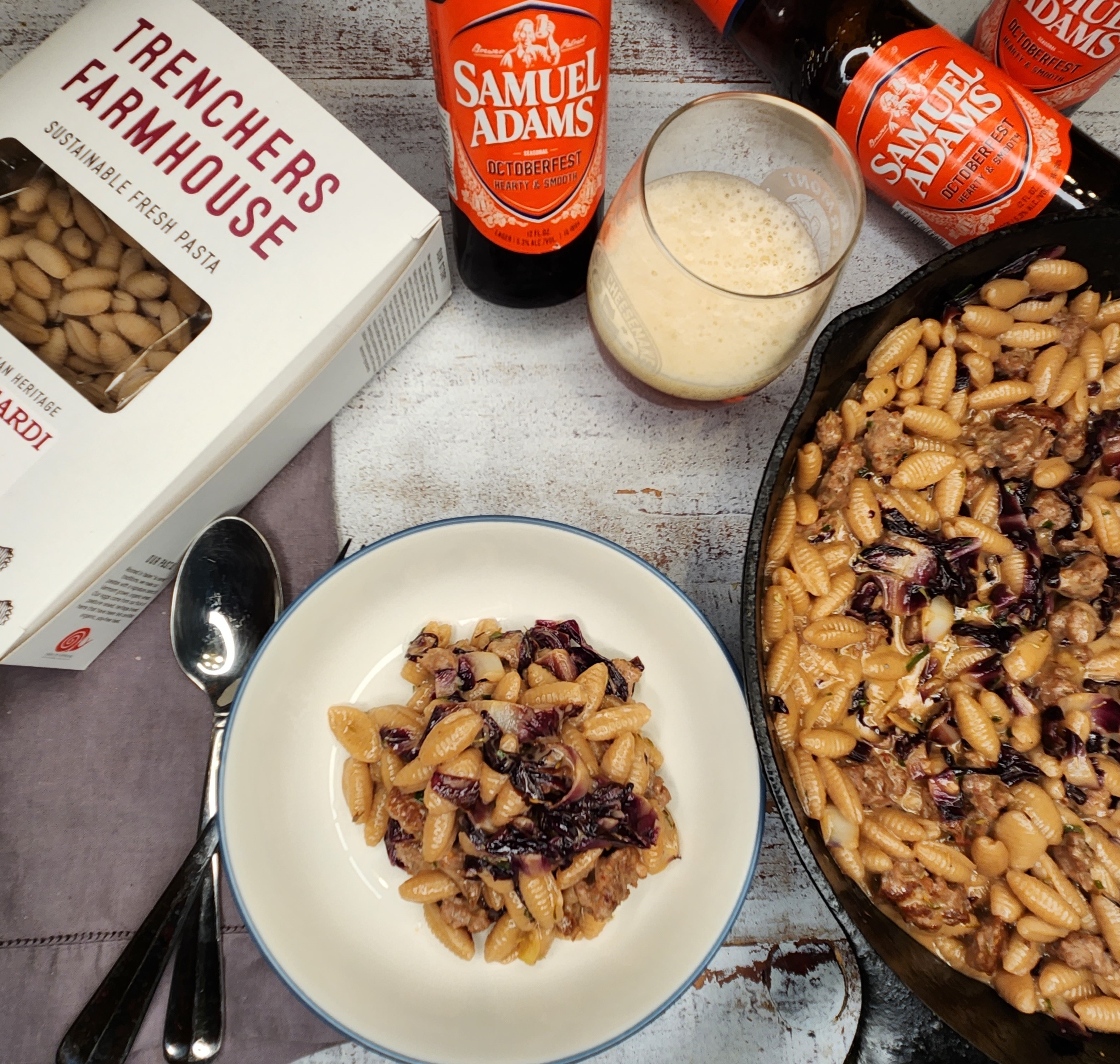 a plate of fresh pasta in a Sam Adams beer sauce with a box of fresh pasta and a glass of beer. Fresh pasta recipe