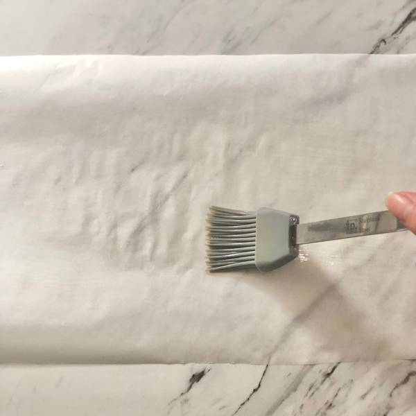 greasing parchment paper with oil