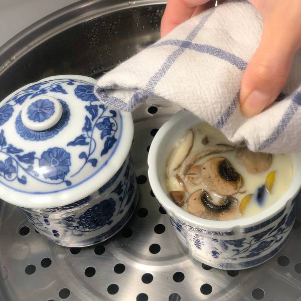 Taking the chawanmushi out of the steamer