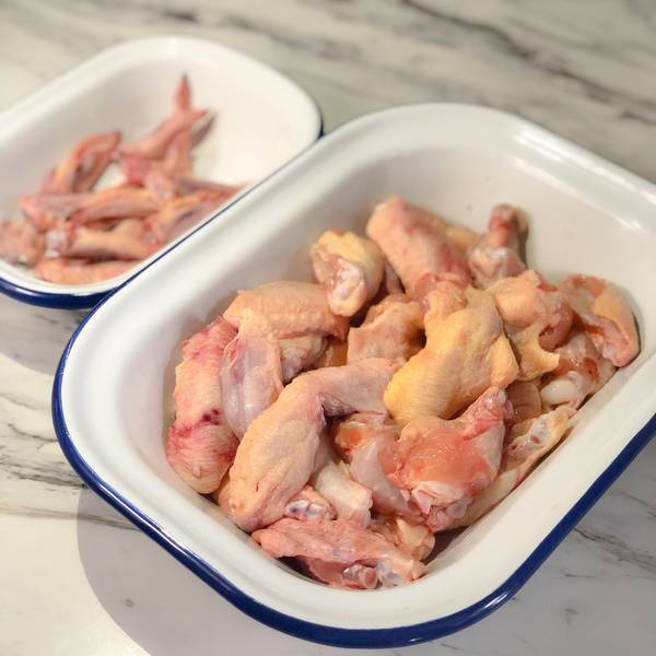 chicken wings and chicken tips, separated