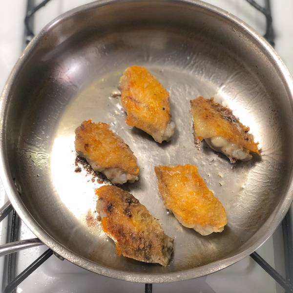 Flipped over chicken wings, golden brown