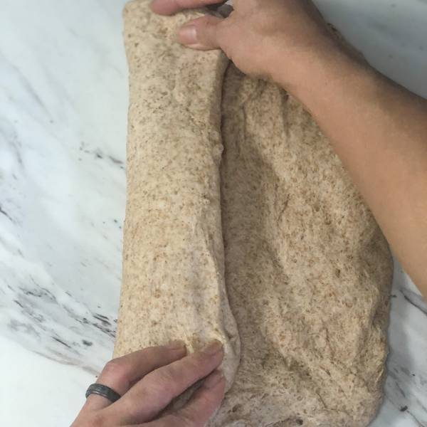 folding the dough from one side