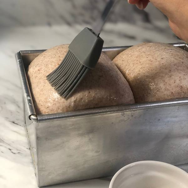 brushing the dough with milk