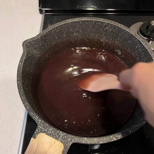 mixing the yokan with a heatproof spatula