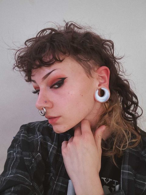 Girl wearing large  Glass Opalite Saddle Plug / Gauge