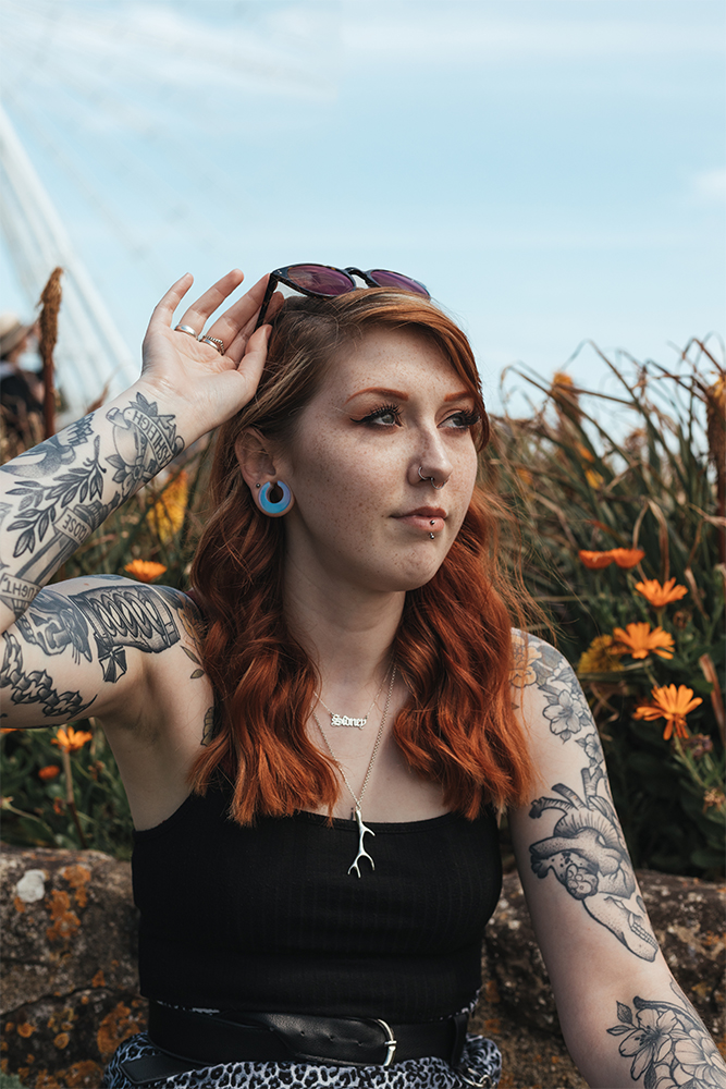 Girl wearing emo  Glass Opalite Saddle Plug / Gauge